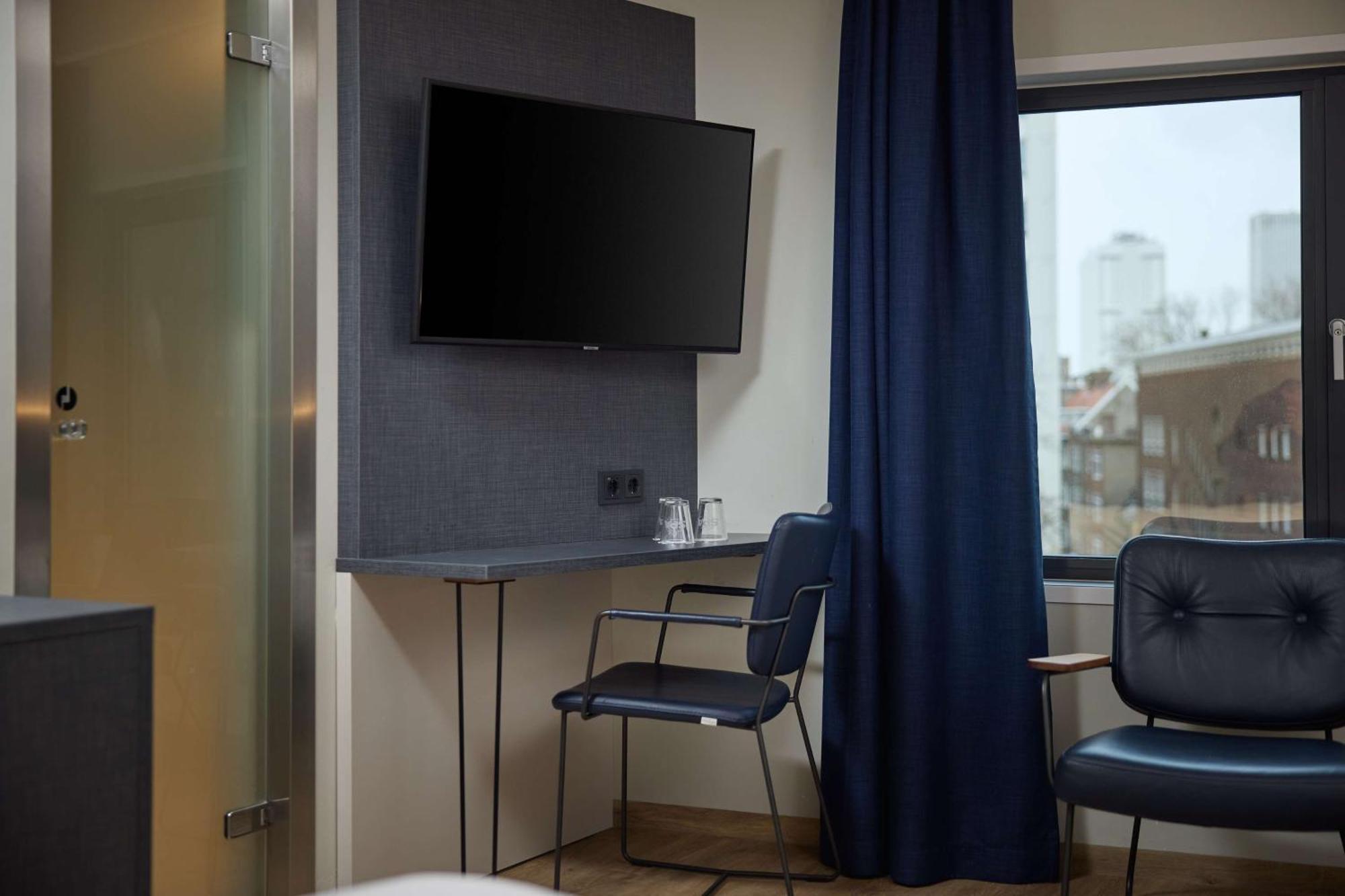 Отель Doubletree By Hilton Rotterdam Centre Экстерьер фото